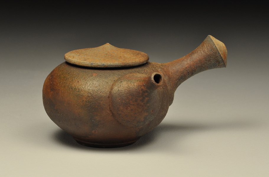 Side handled teapot